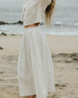 White two piece skirt set and linen two piece set. 