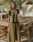 Wide leg olive green pants for women.