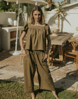 Wide leg olive green pants for women.