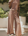 Wide leg sweat pants with drawstring waistband for women.